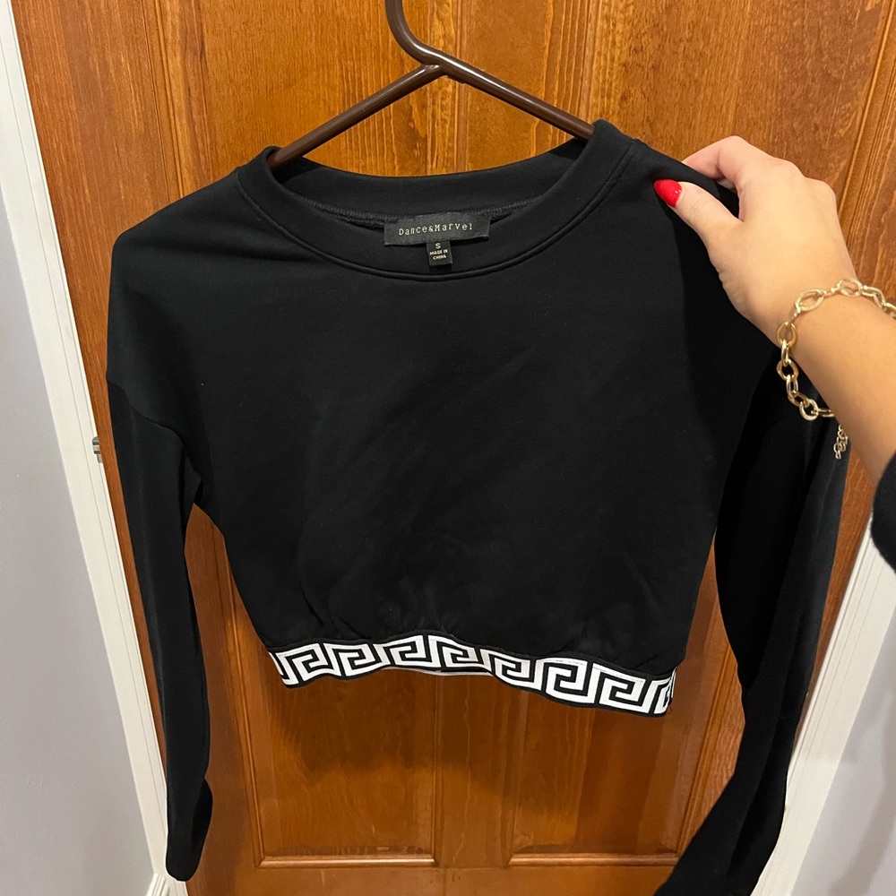 black slightly cropped long sleeve top